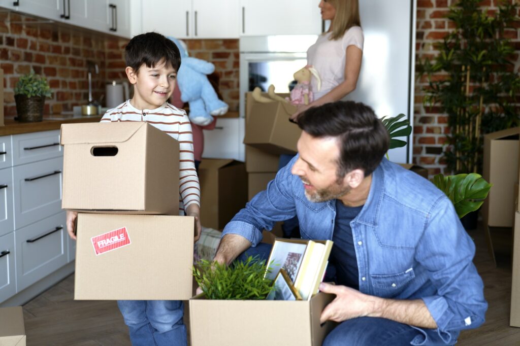 Happy family moving to a new home